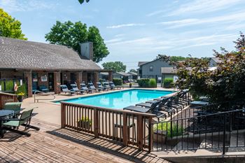 Pool view with sun loungers